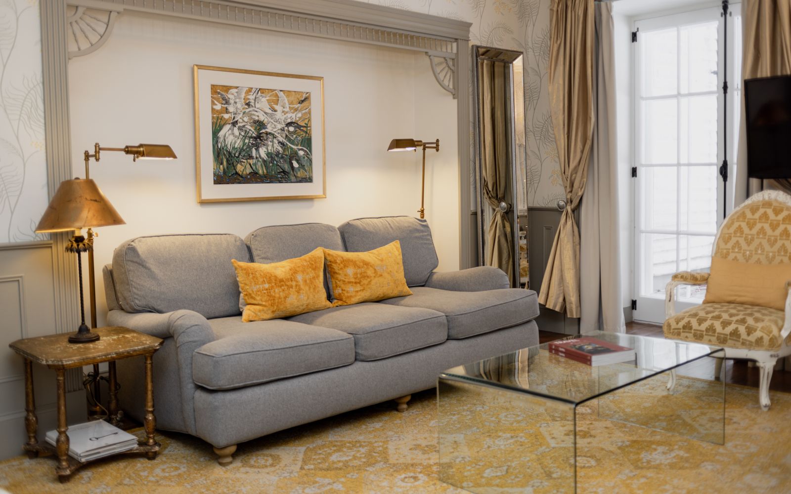 A Living Room With A Couch And A Coffee Table