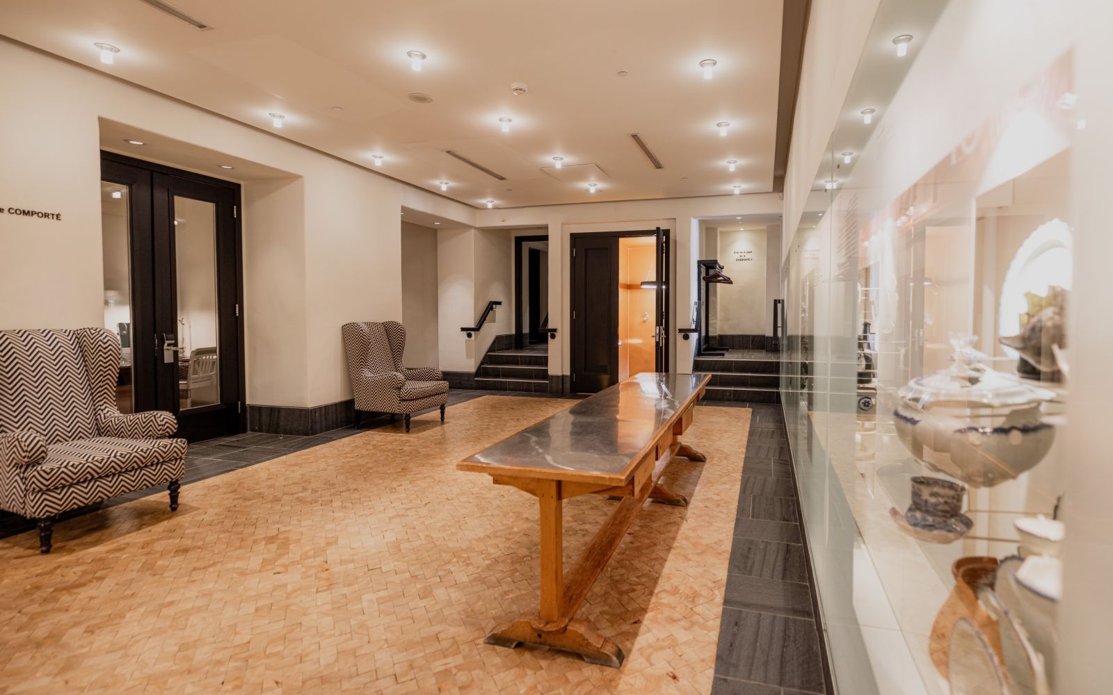 A Large Room With A Table And Chairs